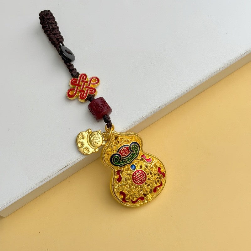 Gold enamel calabash keychain with Chinese knot and fortune cat plaque, brown cord