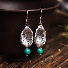 Sterling Silver Turquoise Lotus Leaf Earring - pair on ceramic vessel, nature-inspired