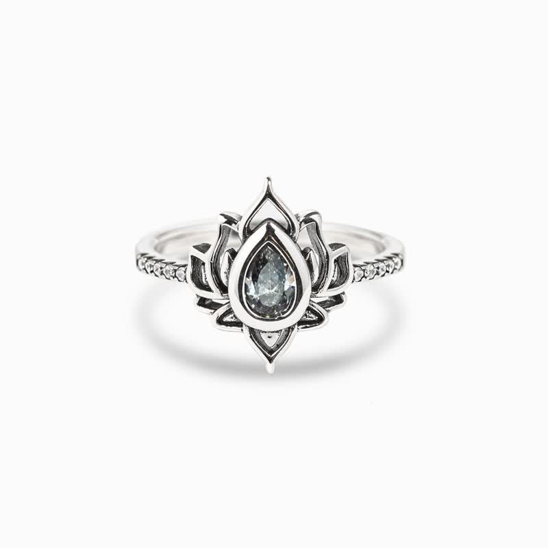Lotus Zircon Ring – silver lotus with pale aquamarine stone, zircon blessing