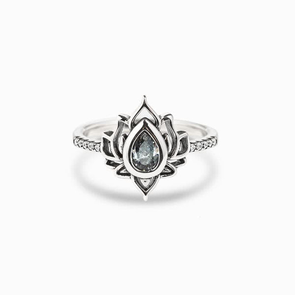 Lotus Zircon Ring – silver lotus with pale aquamarine stone, zircon blessing