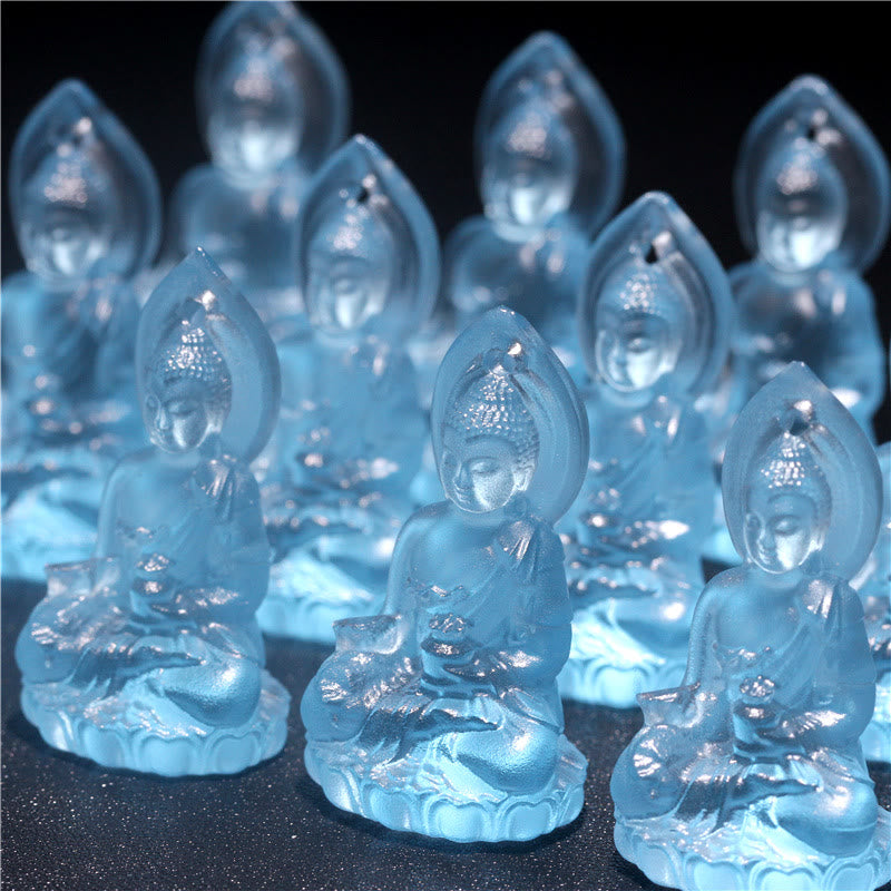 Blue Tathagata Medicine Buddha Liuli Crystal Necklace – rows of identical translucent pendants with lotus bases and teardrop aureoles, shallow depth, internal light glow
