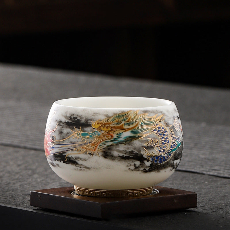 Dragon Playing Pearl Porcelain Teacup – Turquoise and blue dragon coiled through clouds on wooden stand, ceremonial gongfu