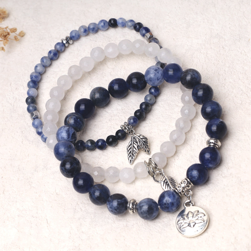 Natural Crystal Bracelet – navy sodalite and white quartz three-layer stack with silver lotus charm, healing bracelet