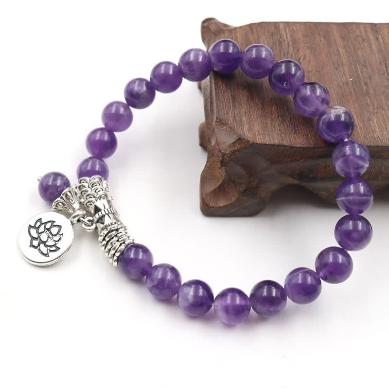 Amethyst Lotus Bracelet - dark wood prop, etched lotus pendant with amethyst dangle, spiritual