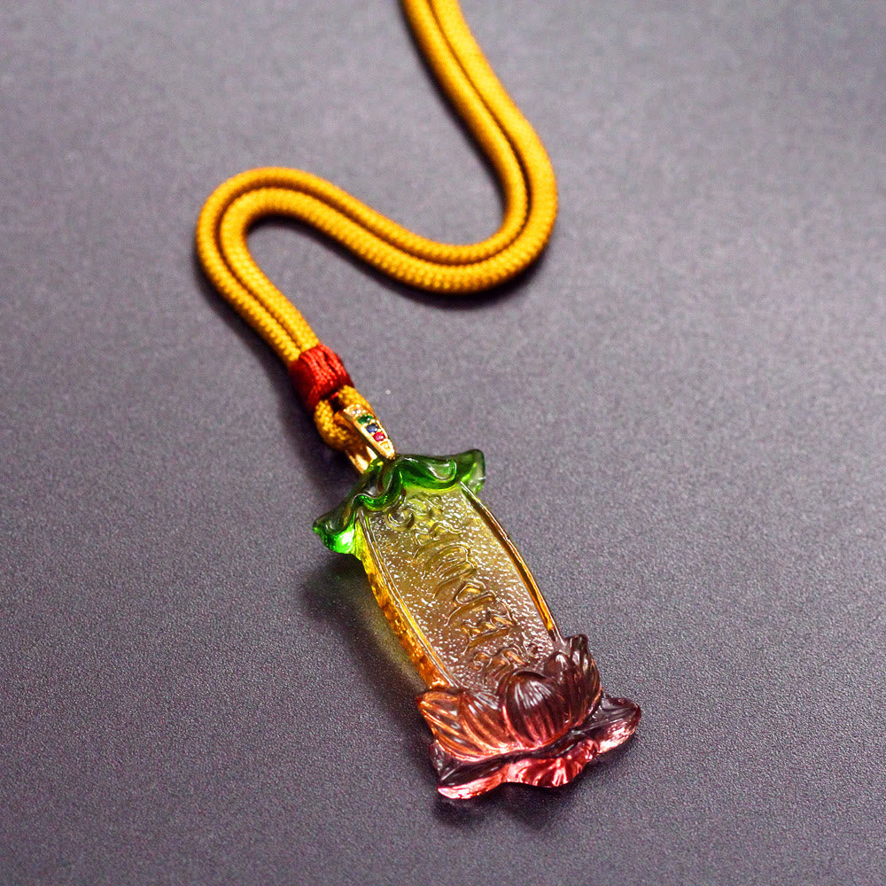 Buddha Liuli Lotus Necklace – pendant glowing under light with blue green iridescence, sacred charm