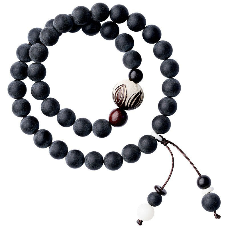 Tibetan Cypress Bodhi Lotus Bracelet - coiled double strand with lotus bead and beaded tassel, balanced