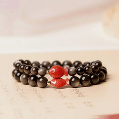 Silver Sheen Obsidian Bracelet – front view, cinnabar koi fish charm, iridescent obsidian beads