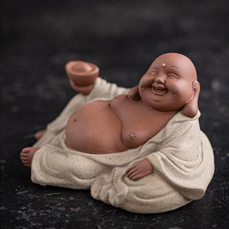 Laughing Buddha Clay Statue – close-up of laughing facial expression, joyful serene craftsmanship