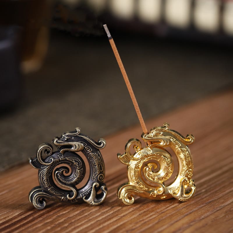 Mini Dragon Incense Burner – Antique bronze and gold dragon holders with traditional scrollwork on warm wood, Zen