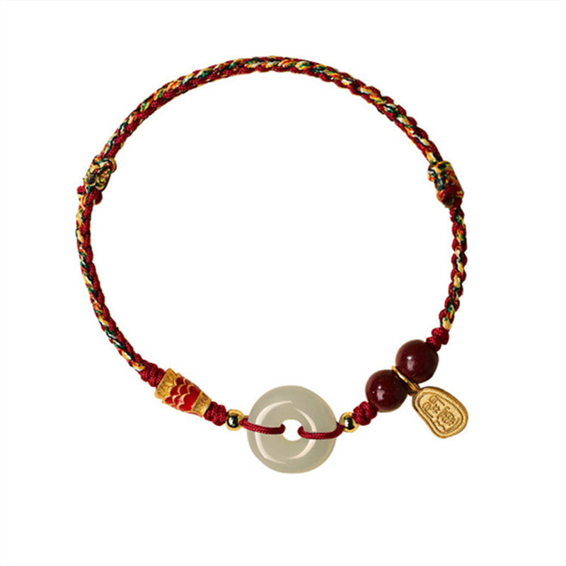 Silver Koi Jade – Top view of bracelet with jade buckle and fish charm, sterling silver