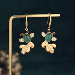 Koi Fortune Earrings - side profile showing jade depth and fish tail curve, 40mm drop