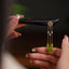 Peridot Ebony Wood Hairpin, black ebony hairpin with gold filigree and peridot bamboo pendant, hand held