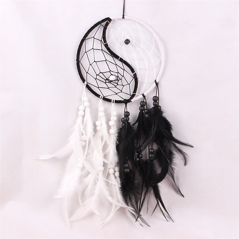Yin Yang Dream Catcher with Feathers – Close-up dual hoop web with beads and feathers, handmade