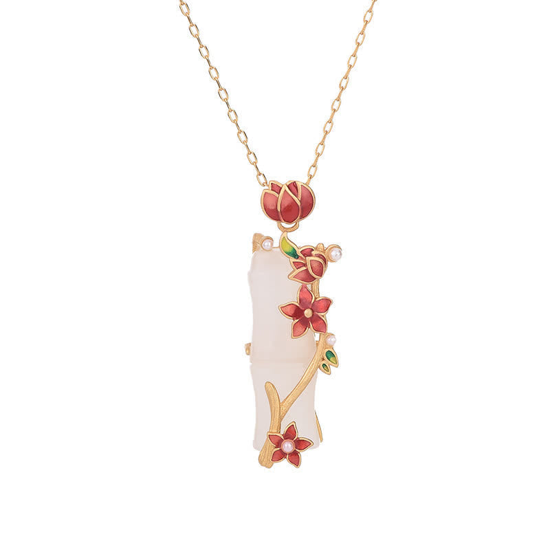 White Jade Bamboo Lotus Necklace – White bg close-up of jade pendant with red lotus enamel and pearls, cloisonne