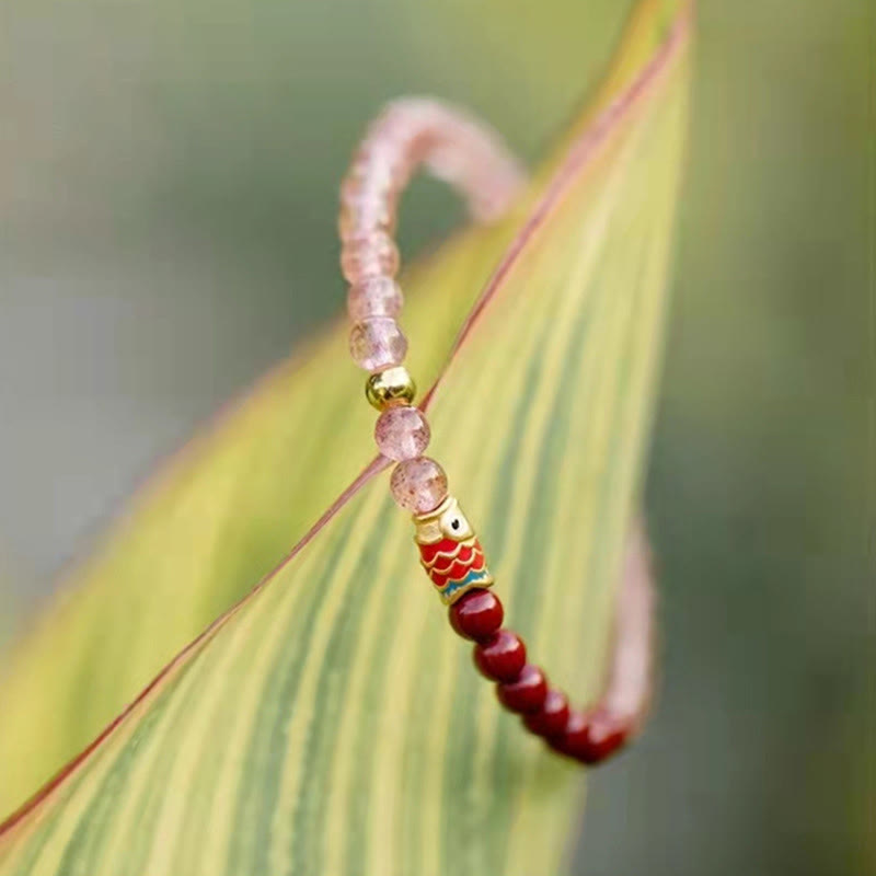 Strawberry Quartz Koi Bracelet – detail shot of three consecutive beads showing pattern rhythm