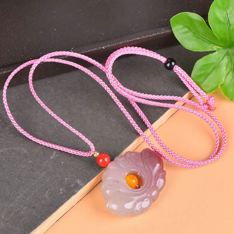 Lotus Pendant Necklace – Lavender carved lotus with orange amber center, pink braided cord, artisan gemstone jewelry