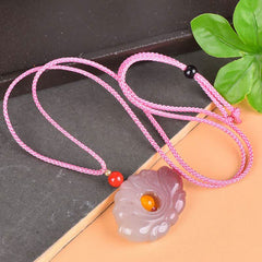 Lotus Pendant Necklace – Lavender carved lotus with orange amber center, pink braided cord, artisan gemstone jewelry