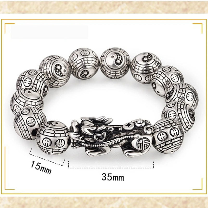 Tibetan Feng Shui PiXiu Silver Bracelet – White background product photo displaying 15mm diameter Bagua carved beads with 35mm Pixiu charm detail