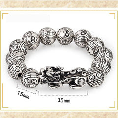Tibetan Feng Shui PiXiu Silver Bracelet – White background product photo displaying 15mm diameter Bagua carved beads with 35mm Pixiu charm detail