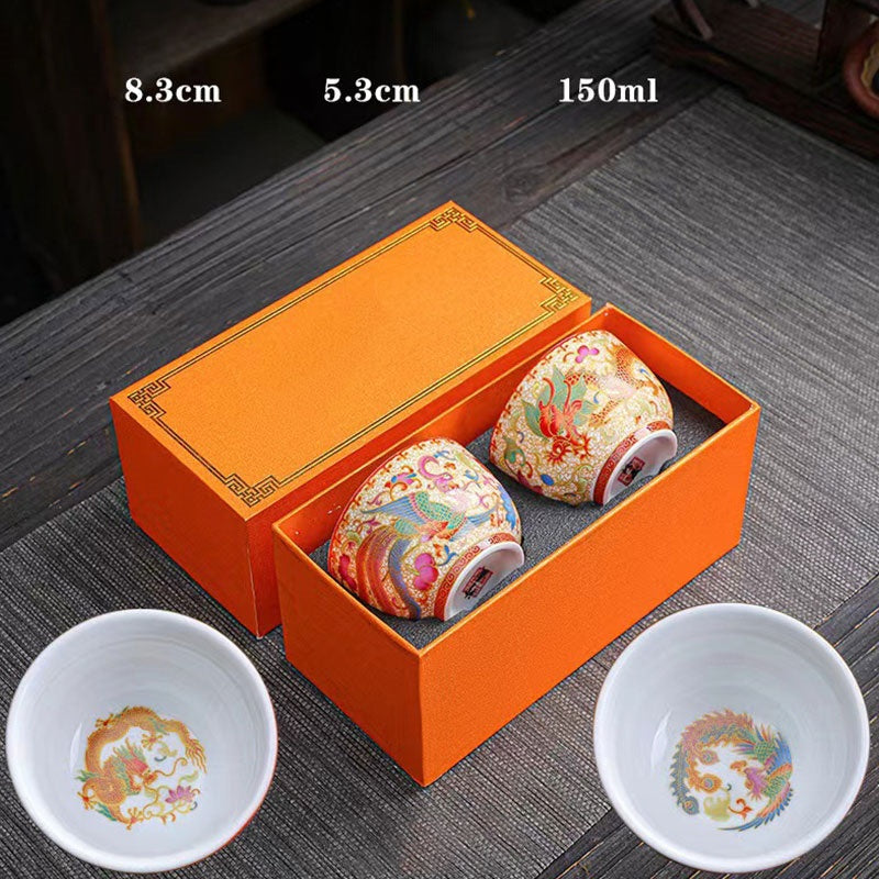 2Pcs Dragon Phoenix Ceramic Teacup Set - Cups with dimensions shown in packaging, handcrafted