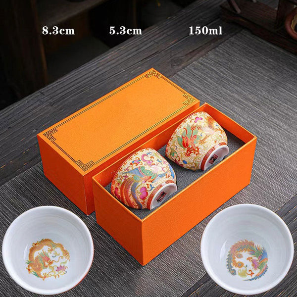 2Pcs Dragon Phoenix Ceramic Teacup Set - Cups with dimensions shown in packaging, handcrafted