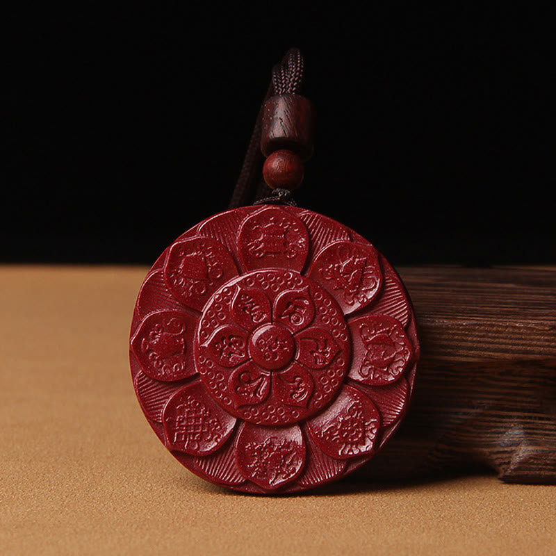 Cinnabar Om Mani Padme Hum Lotus Necklace – front face with mantra center and Buddhist symbols, cinnabar