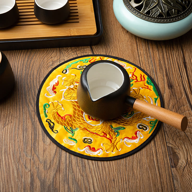 Dragon Embroidery Tea Cup Coaster Mat - imperial yellow dragon with teapot on wood table, tea ceremony setting