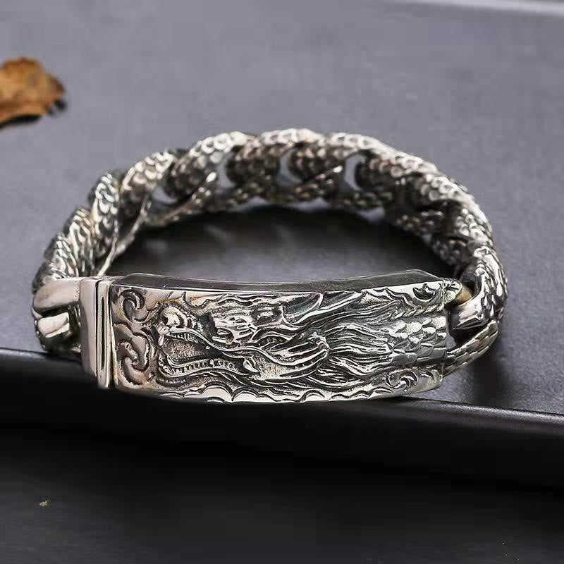 Retro Dragon Bracelet - close-up dragon head clasp on leather, powerful, bold
