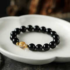 Black Obsidian White Crystal Onyx Dragon Bracelet - Black obsidian beads with gold foil amber bead on lotus dish, Protection