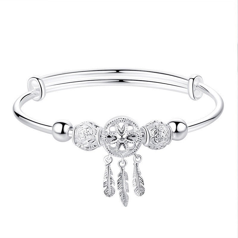 Dream Catcher Blessing Bracelet – Straight-on silver bangle on clean white background, front view product shot