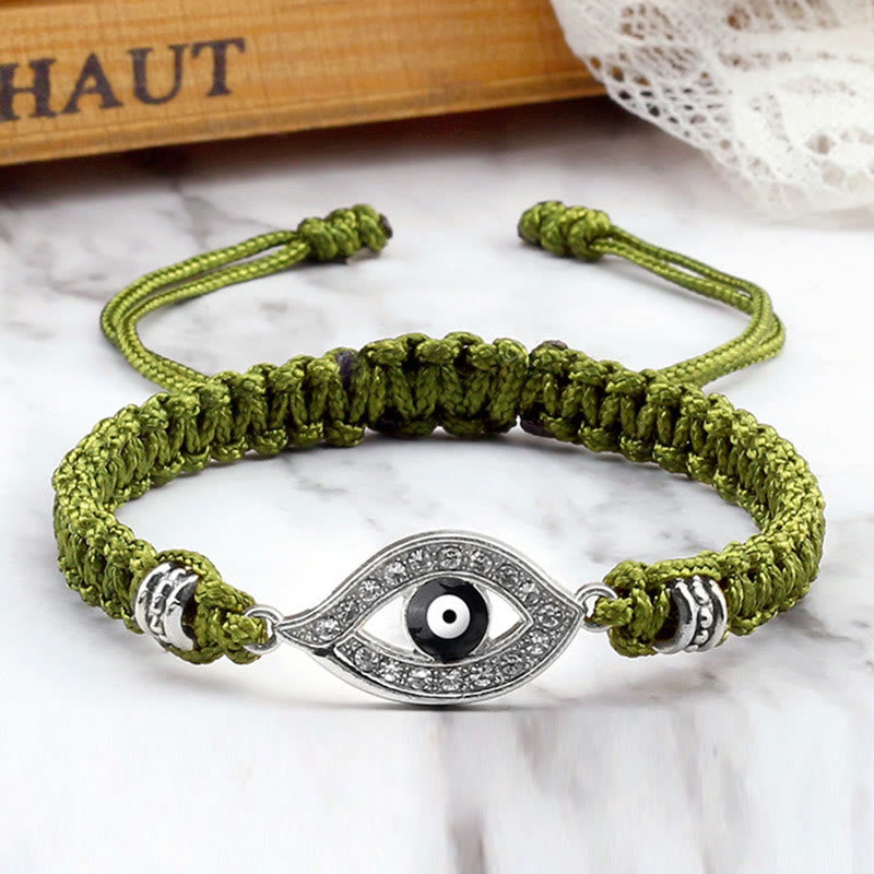 Olive green cord evil eye bracelet with silver crystal evil eye charm, marble photo