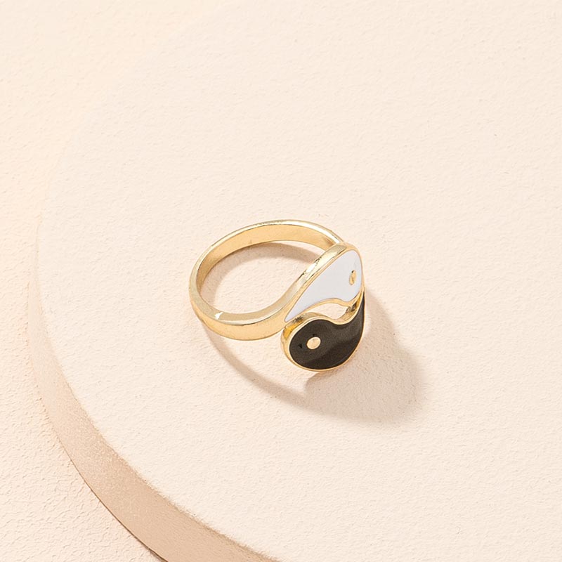 Yin Yang Adjustable Couple Ring - detailed gold yin-yang symbol ring with contrasting enamel on neutral surface