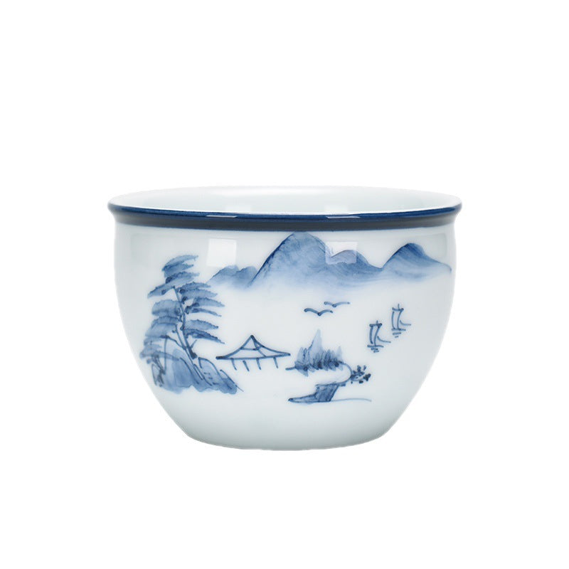 Koi Landscape Teacup – With tea poured revealing underwater koi scene