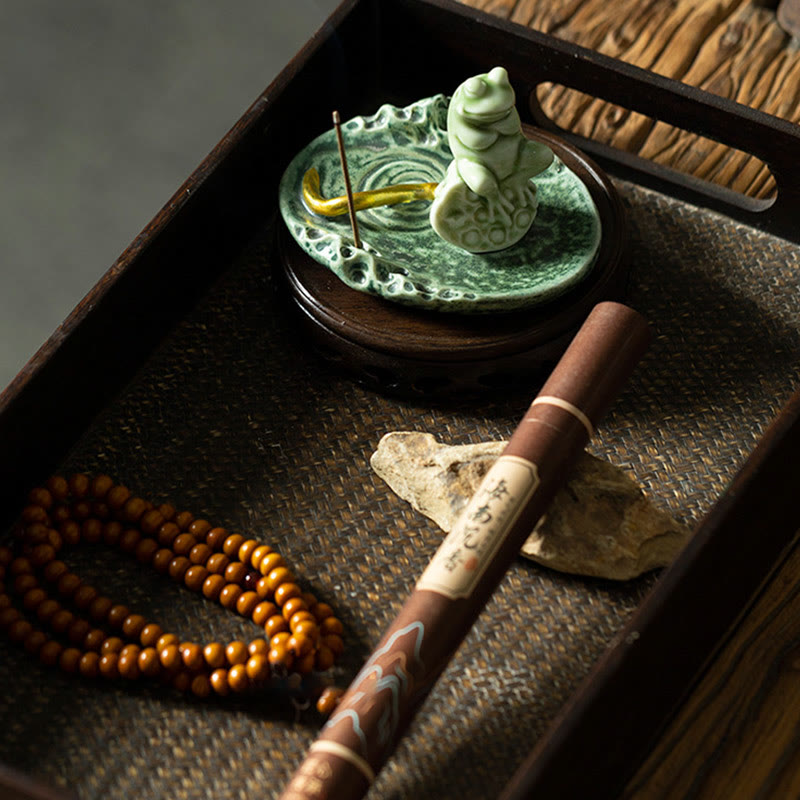 Ceramic Frog Incense Burner – On dark mat with incense smoke, Ritual atmosphere