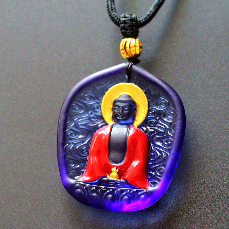 Liuli Crystal Medicine Buddha Pendant – purple liuli with gold halo and cloud pattern background, side angle