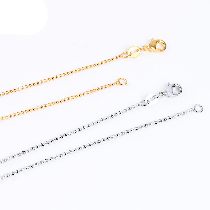 Quartz Crystal Tree of Life Necklace – gold and silver ball chains, dual color, flat lay, jewelry hardware