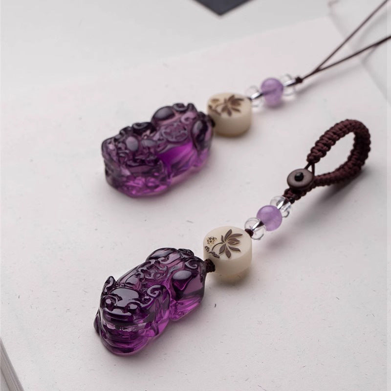 Amethyst Pi Yao Keychain, lifestyle shot, lucky charm