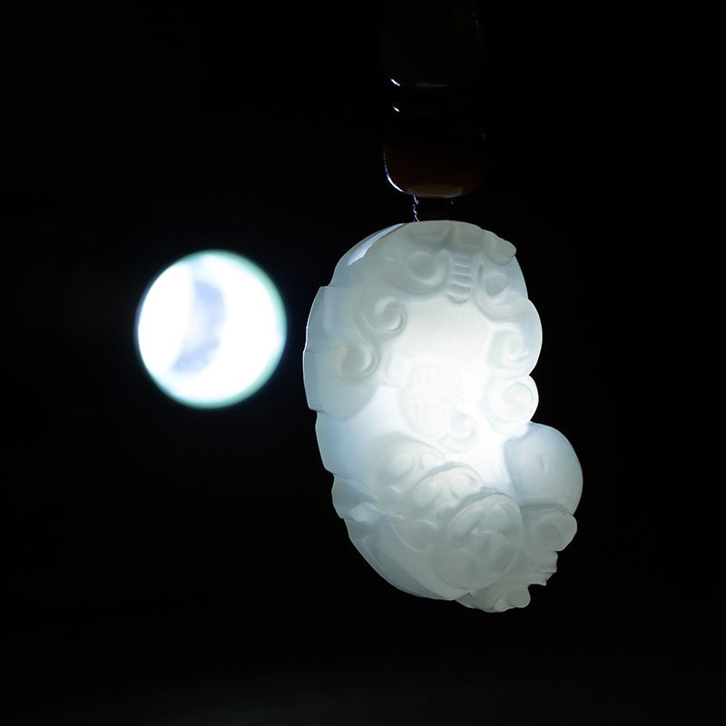 Jade Pi Xiu Keychain for Wealth and Car Protection, close-up detail, lucky charm