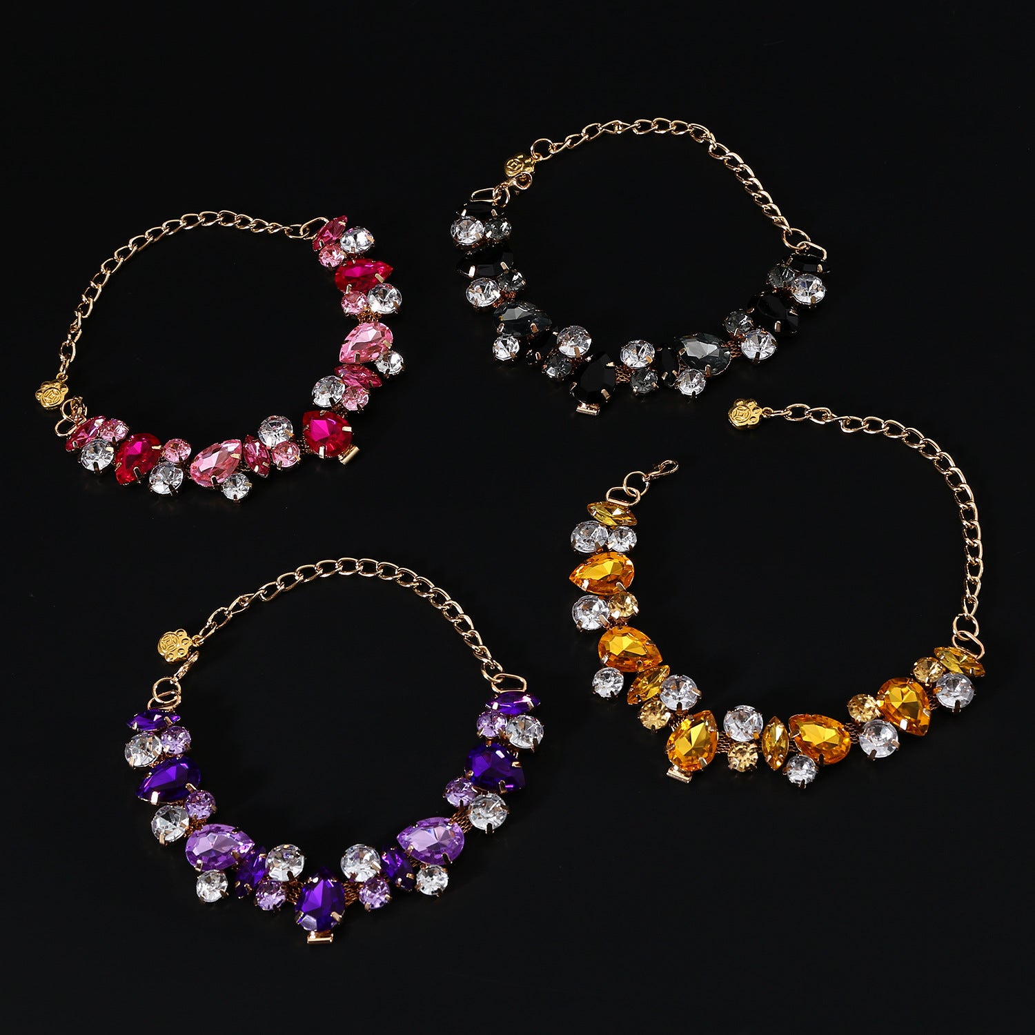 Pet Rhinestone Necklace – Four color variants pink black purple amber crystal bib collars on black, pet jewelry set