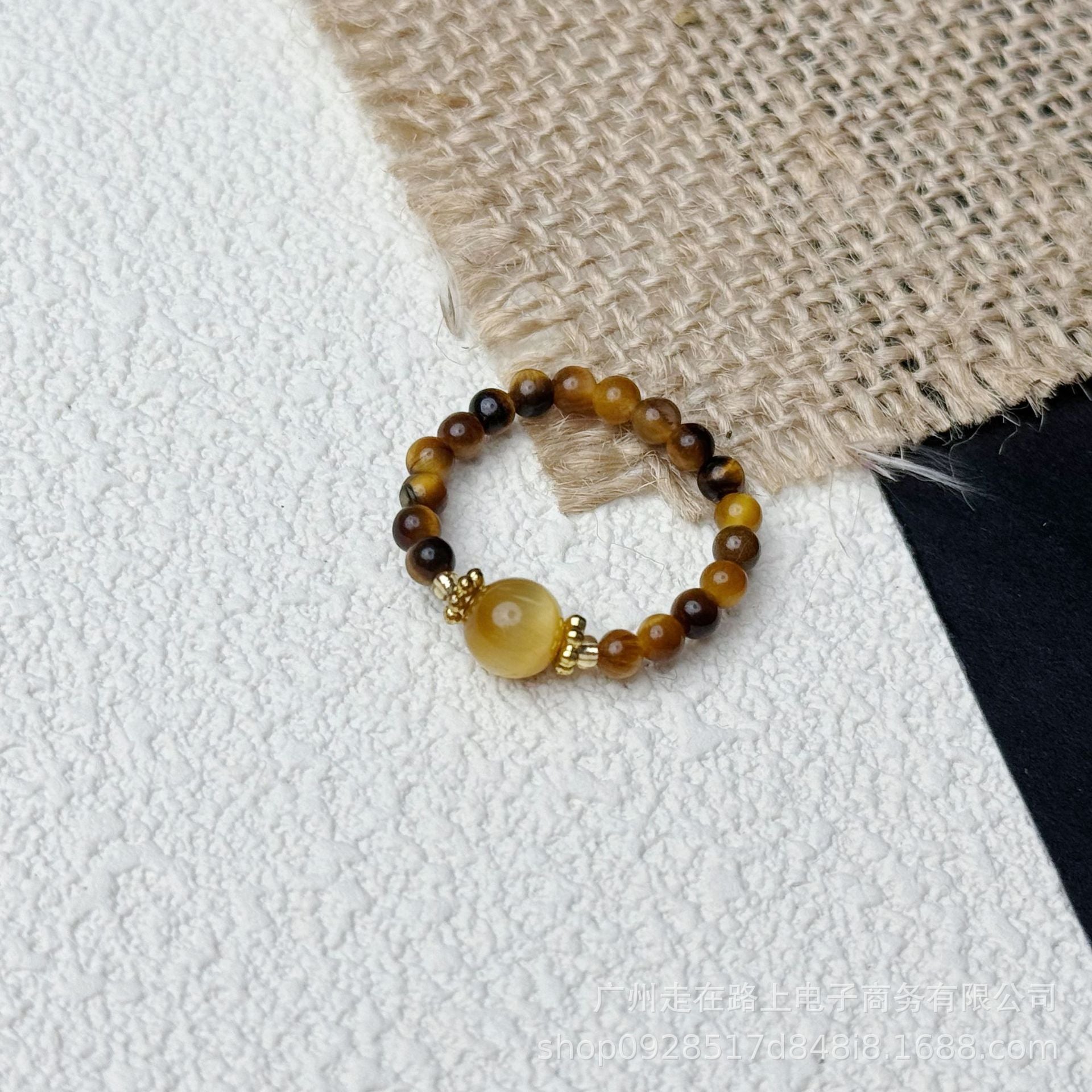Tiger Eye Beaded Ring – Single tiger eye bead ring with yellow center on burlap, adjustable crystal ring