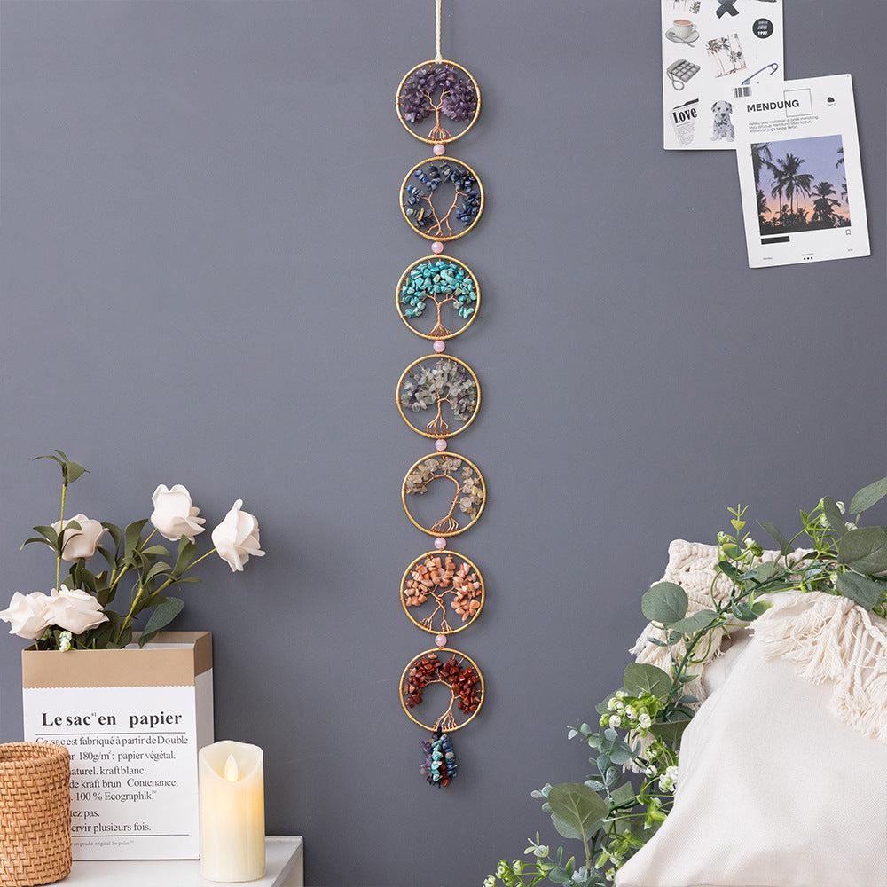 Chakra Tree of Life – displayed on gray wall with white roses and candle, bohemian crystal decor