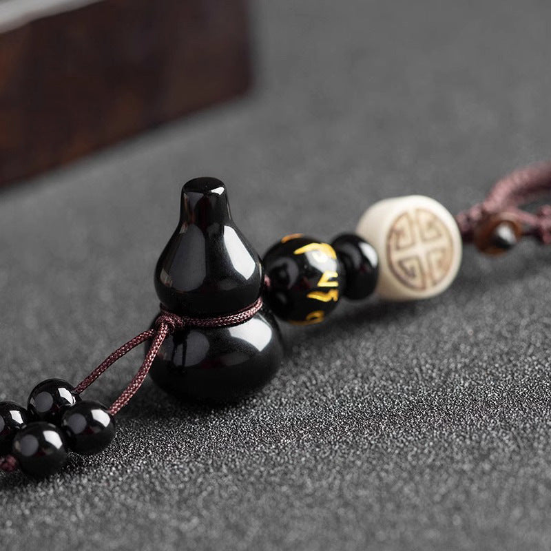 Black Obsidian Hulu Gourd Keychain, detail shot, lucky charm