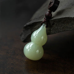 Jade Gourd Sandalwood Car Keychain, angled view, lucky charm