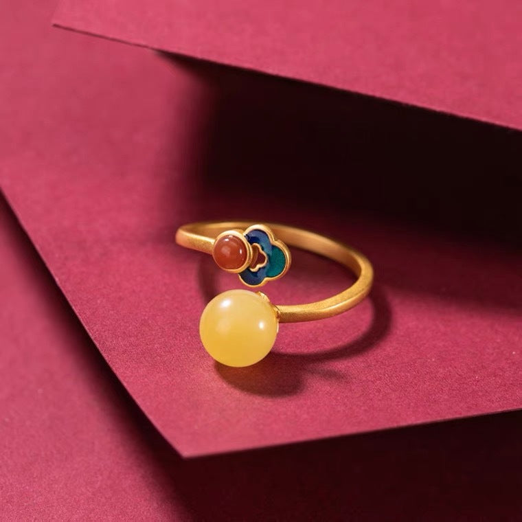 Hetian Jade Clouds Ring – yellow jade bead with blue cloud enamel and red coral on red backdrop, lucky ring