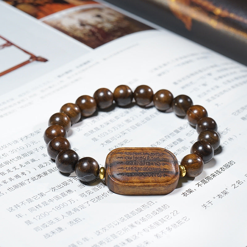 Natural Agarwood Carved Mala Bracelet, detail shot, healing bracelet