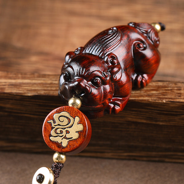 Red Sandalwood PiXiu Keychain, lifestyle shot, lucky charm