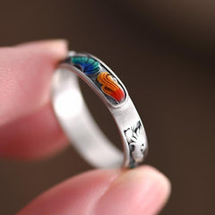 Enamel Fox Ring – Hand holding silver fox ring showing detailed colorful enamel tail craftsmanship, fantasy jewelry