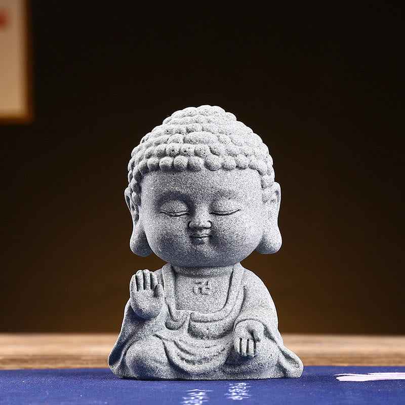 Meditation Praying Buddha Statue – sandstone surface pores and mineral flecks macro, natural stone