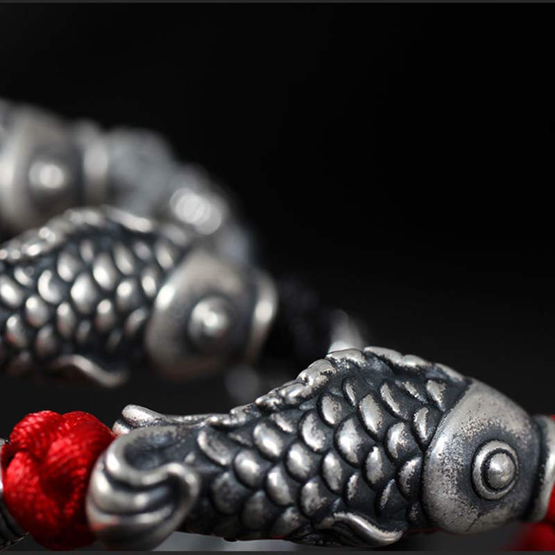 999 Silver Koi Fish Red String Bracelet – red braided cord macro detail, handwoven protection string