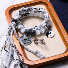 Mountain Ghost Yin Yang Bracelet - black obsidian beads with yin-yang on wood tray, zen bracelet